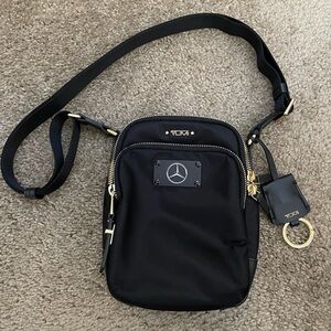 Tumi Black and Gold Messenger Bag